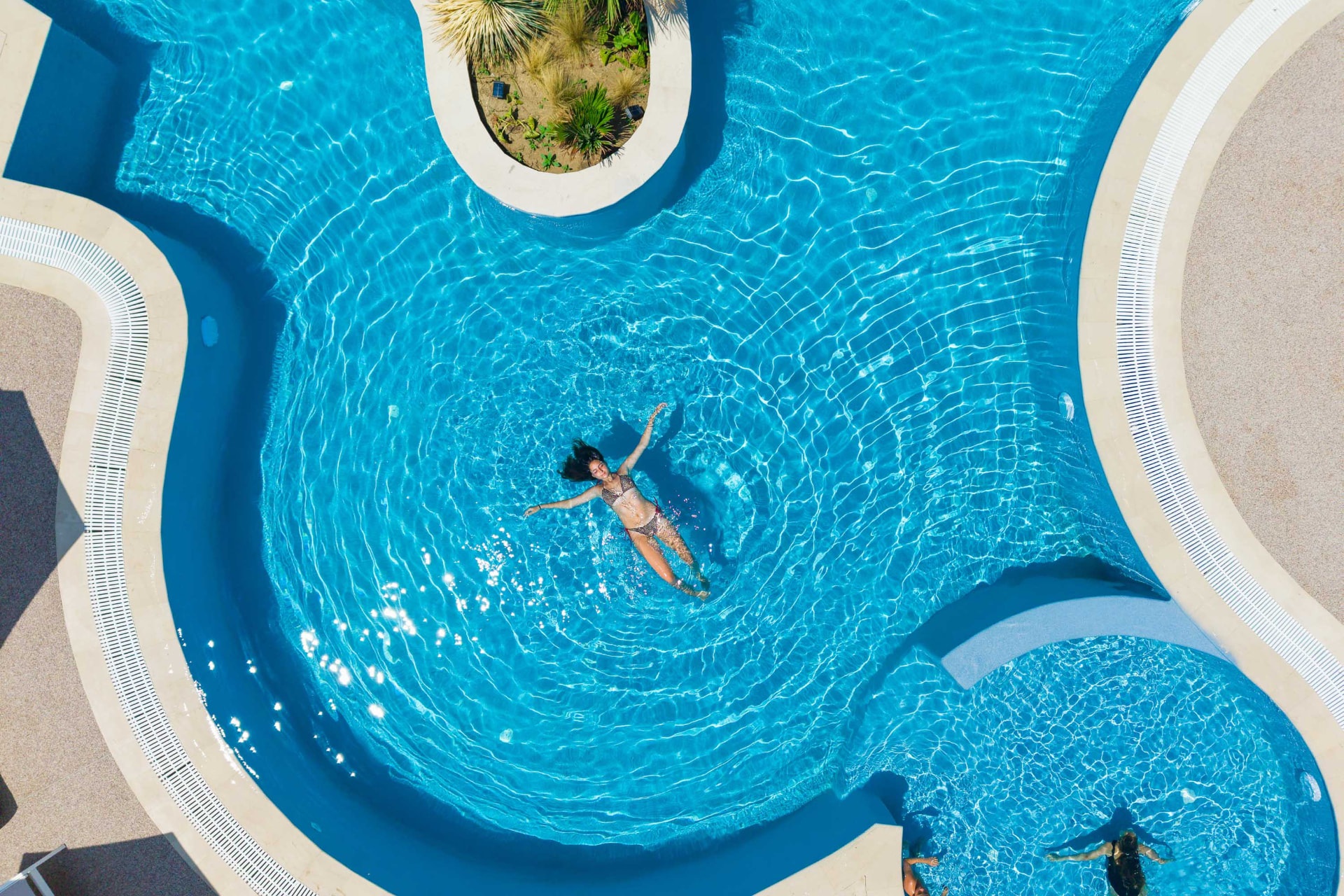 floating in the anese pool from above